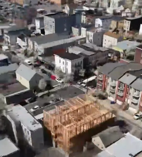 Close aerial view of the site